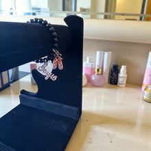 Load image into Gallery viewer, 8mm Black Beaded Bracelet with Boujie and Shoes Charms
