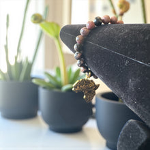 Load image into Gallery viewer, 8mm Black/Pink Beaded Bracelet with The Shape of Africa Charm
